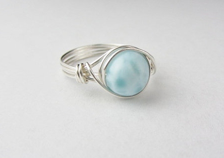 The pretty wire wrapped ring includes a stunning Larimar bead. This piece is from Sara at Blue Soul Designs. 