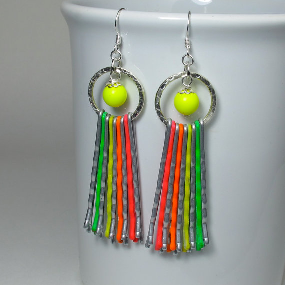 I adore these long neon earrings by Heather at BlueKat Designs. Look close and see if you can tell what they are made out of! 