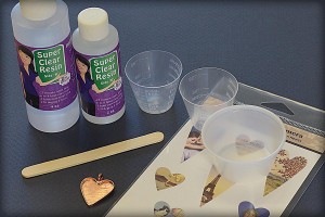 Free tutorial from www.rings-things.com - tools and supplies needed to make a Super Clear Resin and Bezel pendant featuring Piddix images.