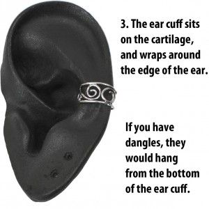The ear cuff sits on the cartilage, and wraps around the edge of the ear.